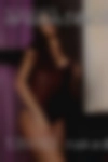 Naked woman city lights camera